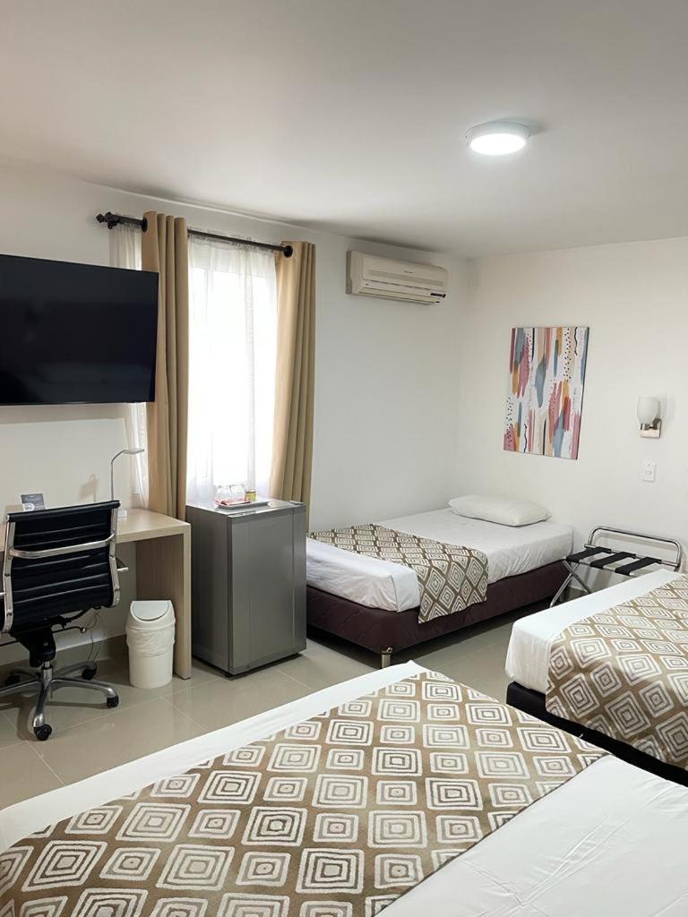 Hotel Juan Maria Tuluá エクステリア 写真